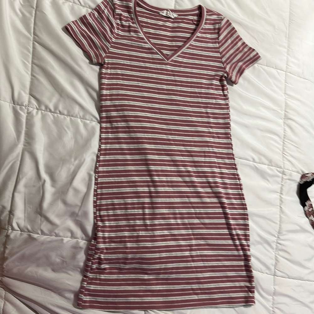 Size medium pink rose dress fits like a medium.